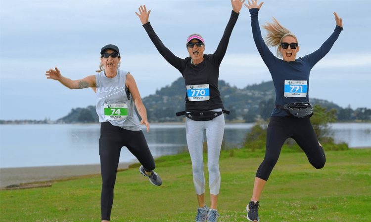 Pauanui Half Marathon Run Participants Jump